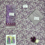 Elegant 3 Pcs Women’s Unstitched Printed Lawn Suit in beautiful grey color. Made with soft lawn fabric, featuring a printed shirt, plain trouser, and printed dobby lawn dupatta — perfect for casual and summer wear. STOREONE.PK