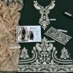 Elegant green 3-piece lawn suit with beautiful white embroidery, perfect for Eid, weddings, and festive occasions. Comes with a matching trouser and a lightweight printed dupatta for a complete, graceful look. STOREONE.PK